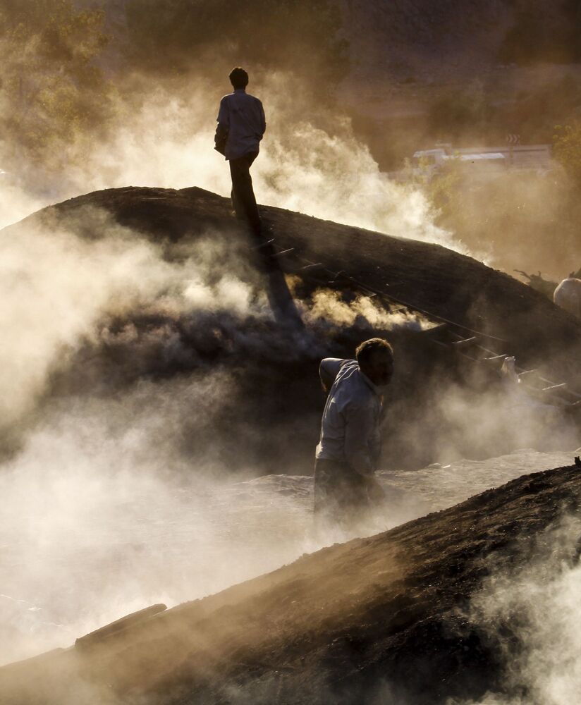 Wood charcoal workers