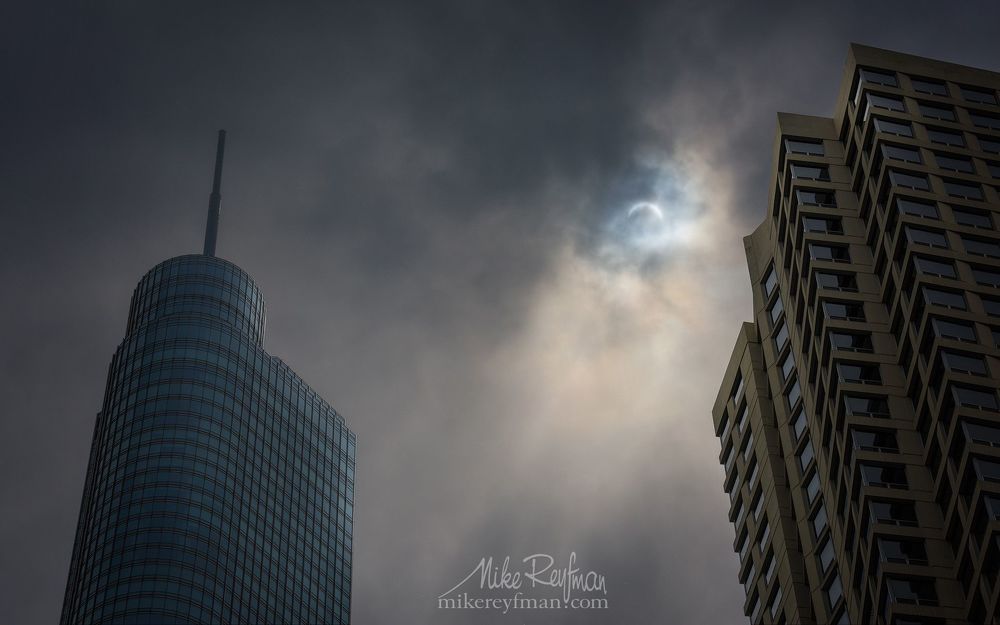 Trump Tower, Plaza 440 tower, and Solar Eclipse