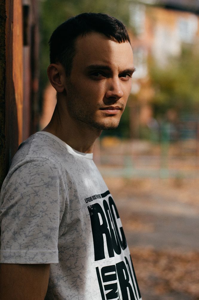 J.