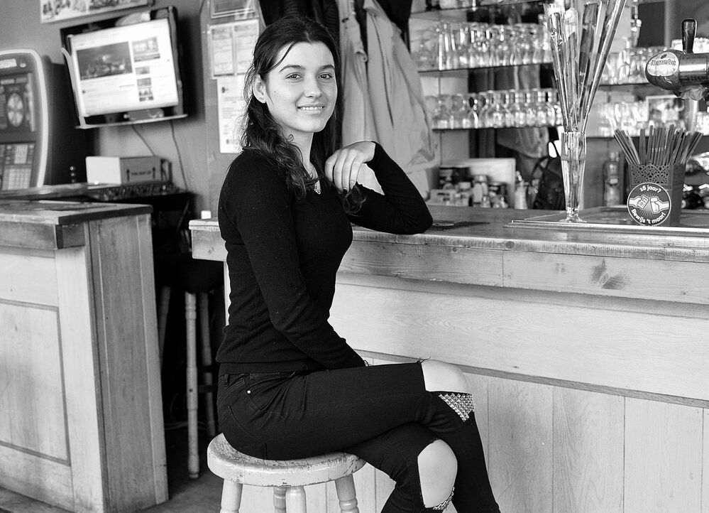 Portraits of bistro owners.
