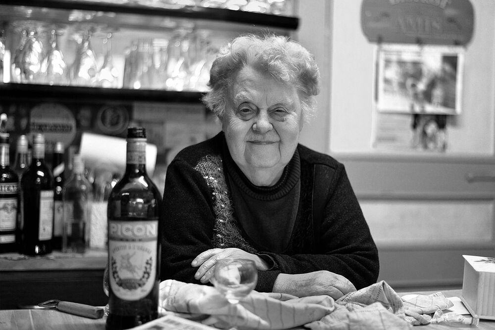 Portraits of bistro owners.