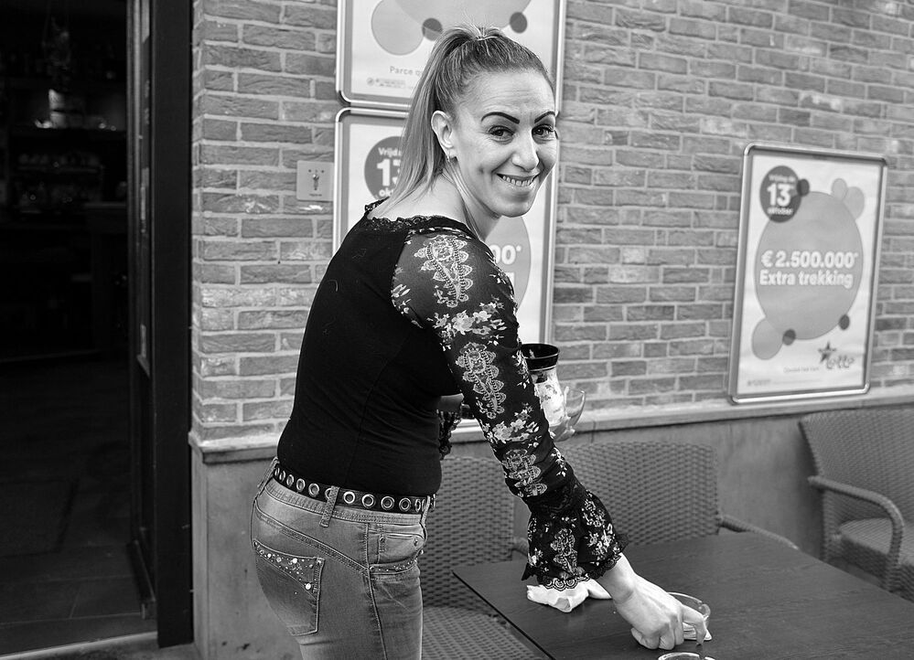 Portraits of bistro owners.