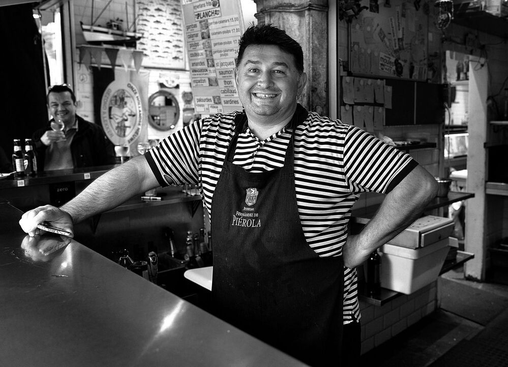 Portraits of bistro owners.