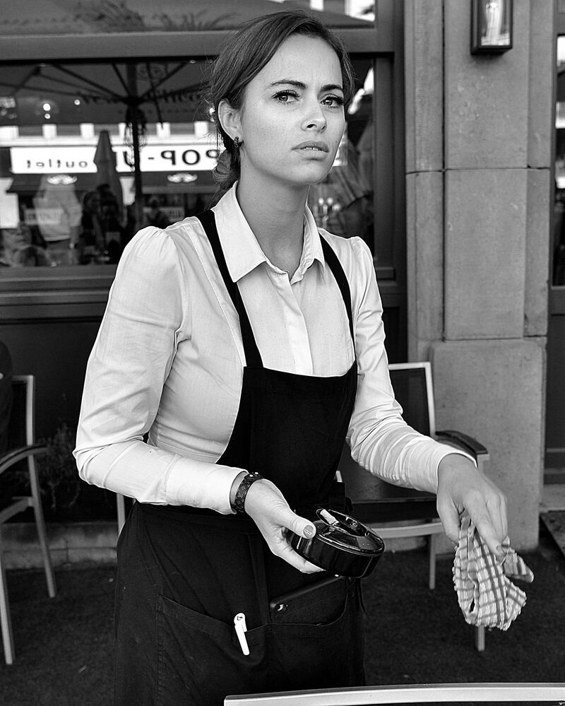 Portraits of bistro owners.