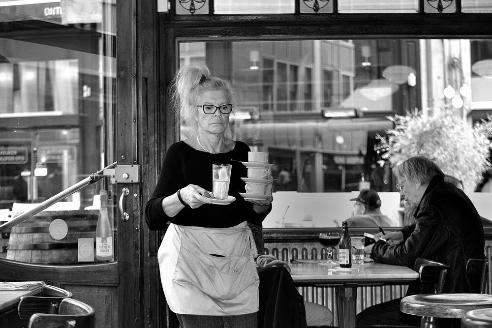 Portraits of bistro owners.