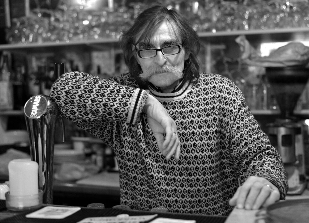 Portraits of bistro owners.