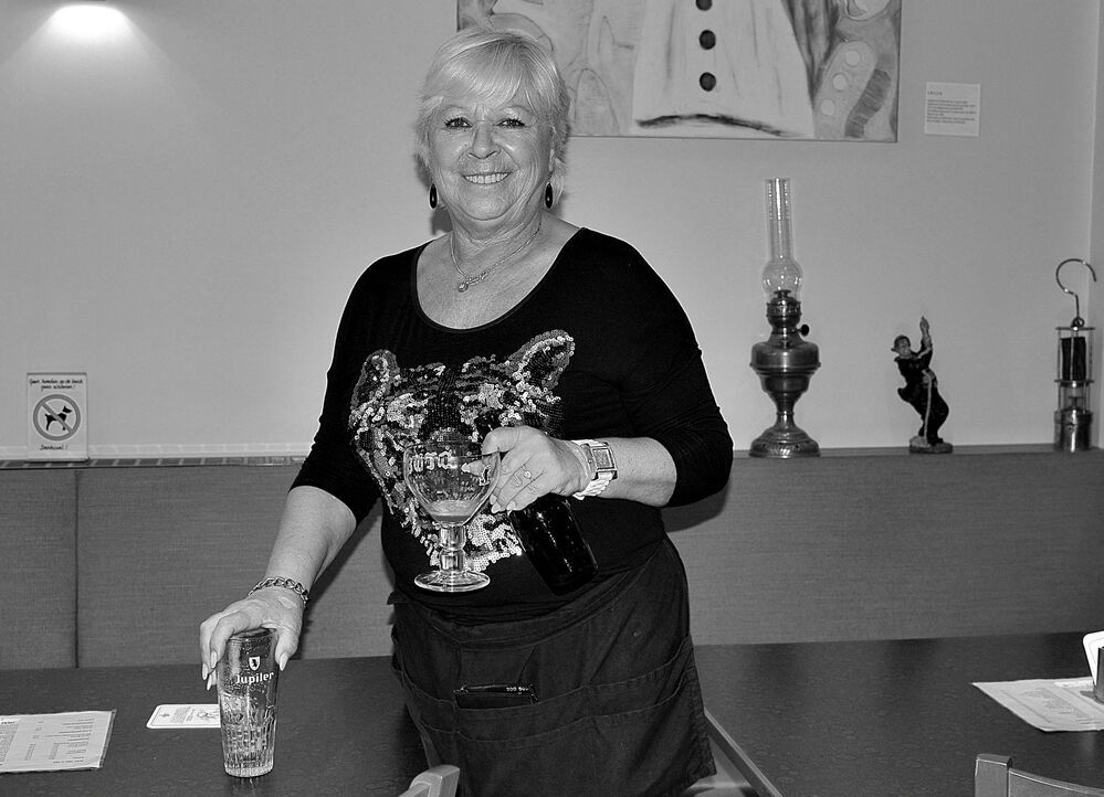 Portraits of bistro owners.