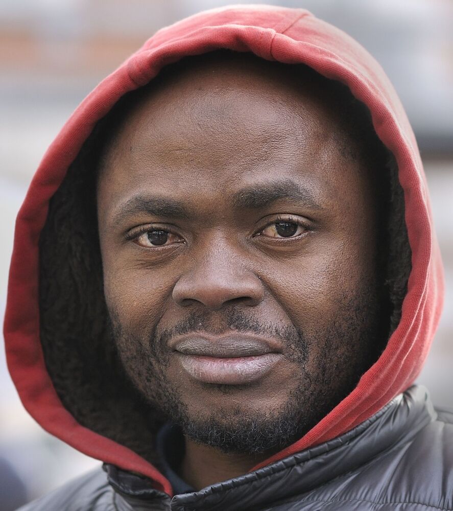 Street portraits in the black district of Brussels:The Matong&eacute;.