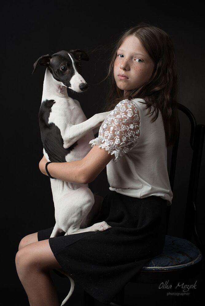 Portrait of a girl with a dog