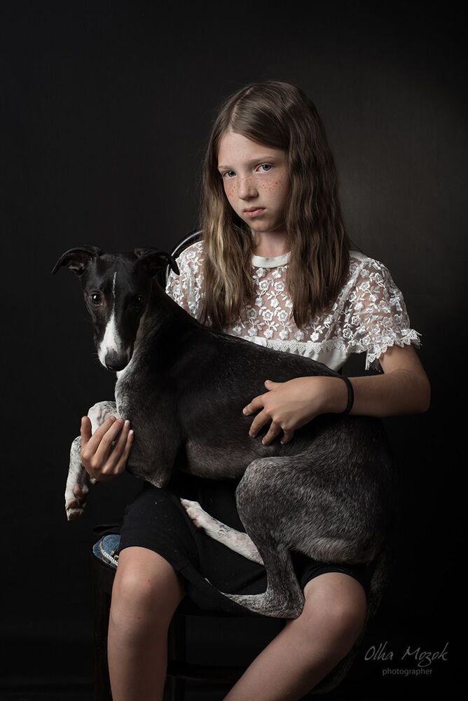 Portrait of a girl with a dog