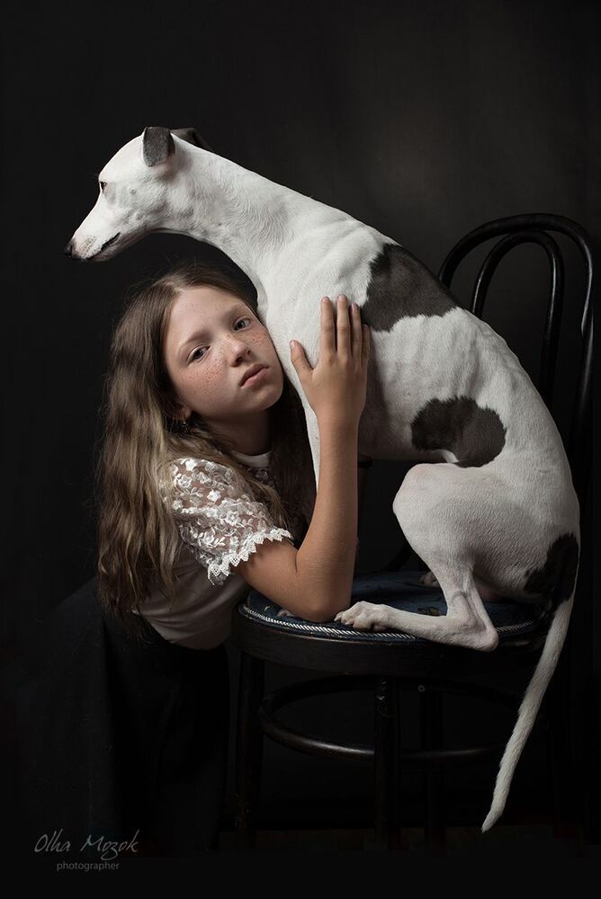 Portrait of a girl with a dog