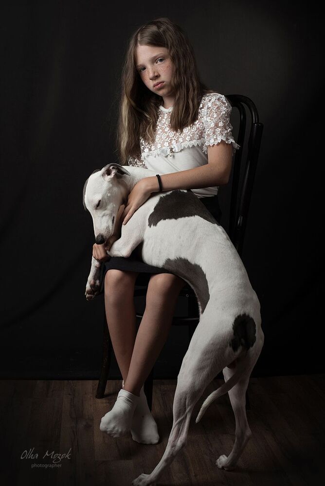 Portrait of a girl with a dog