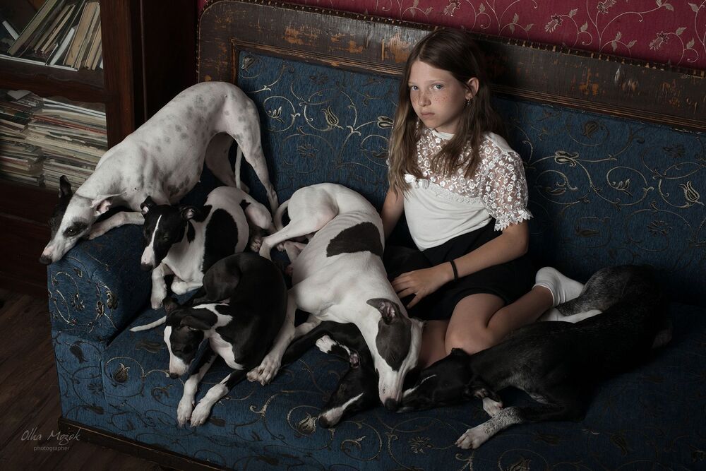 Portrait of a girl with dogs