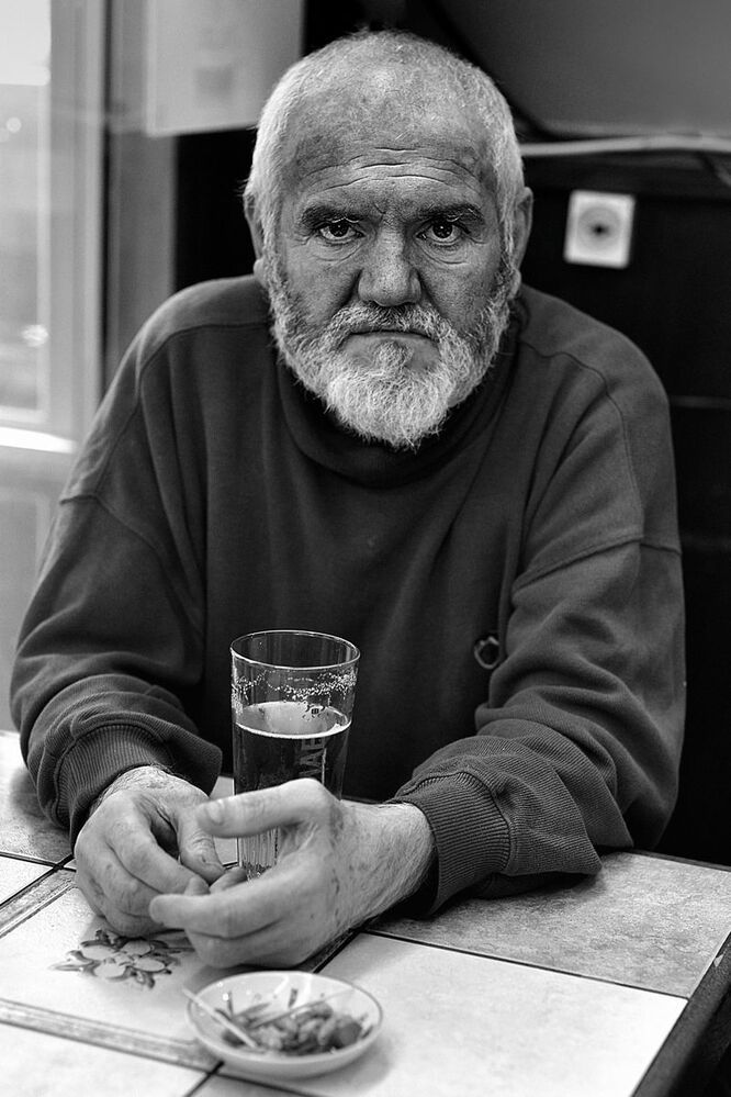Portraits of bar visitors.