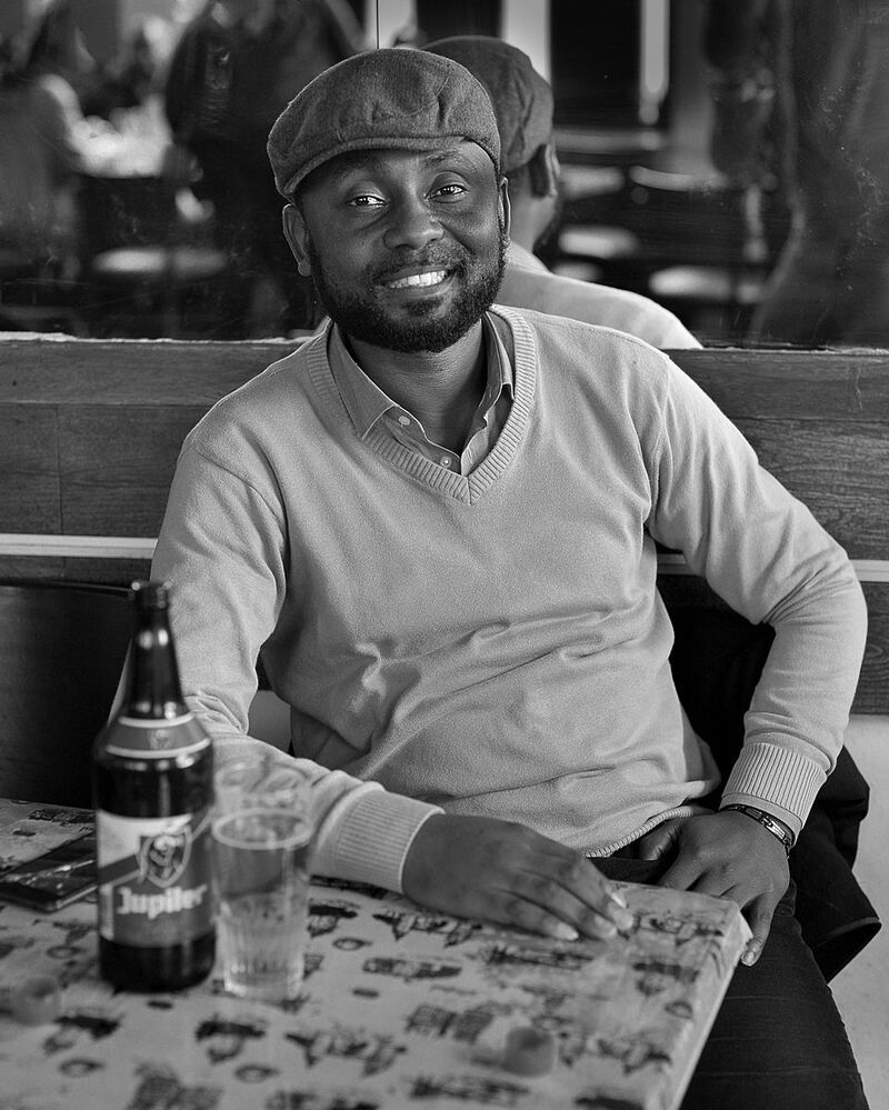 Portraits of bar visitors.