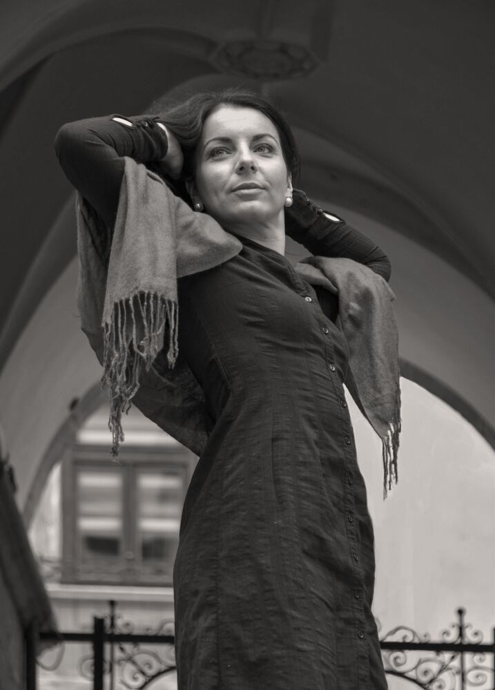 "Woman with a camomile" Woman Portrait. Sepia Version.