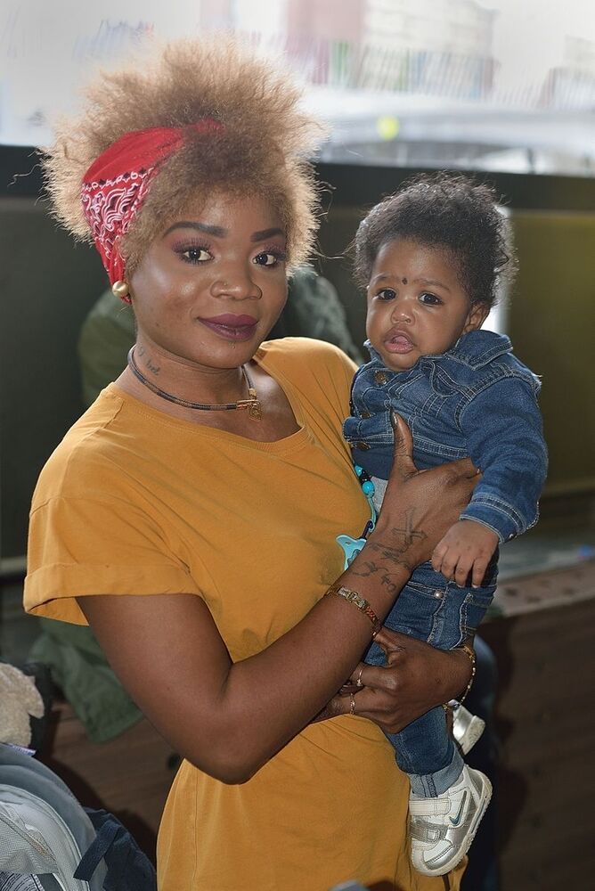 Portraits of African women in the pubs of Li&egrave;ge(Belgium).