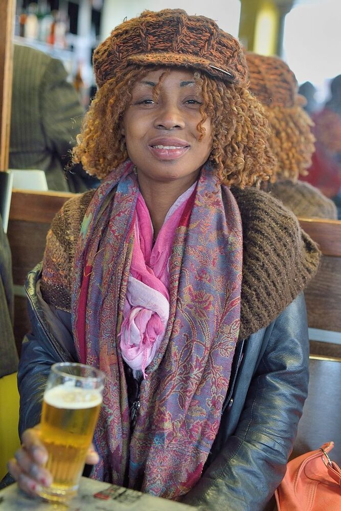 Portraits of African women in the pubs of Li&egrave;ge(Belgium).