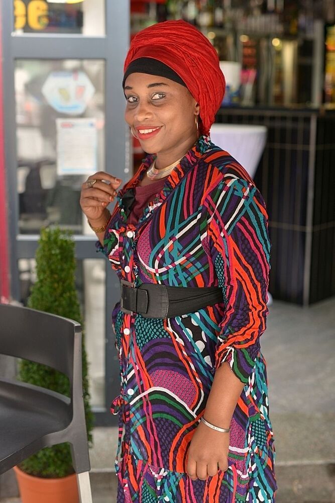 Portraits of African women in the pubs of Li&egrave;ge(Belgium).
