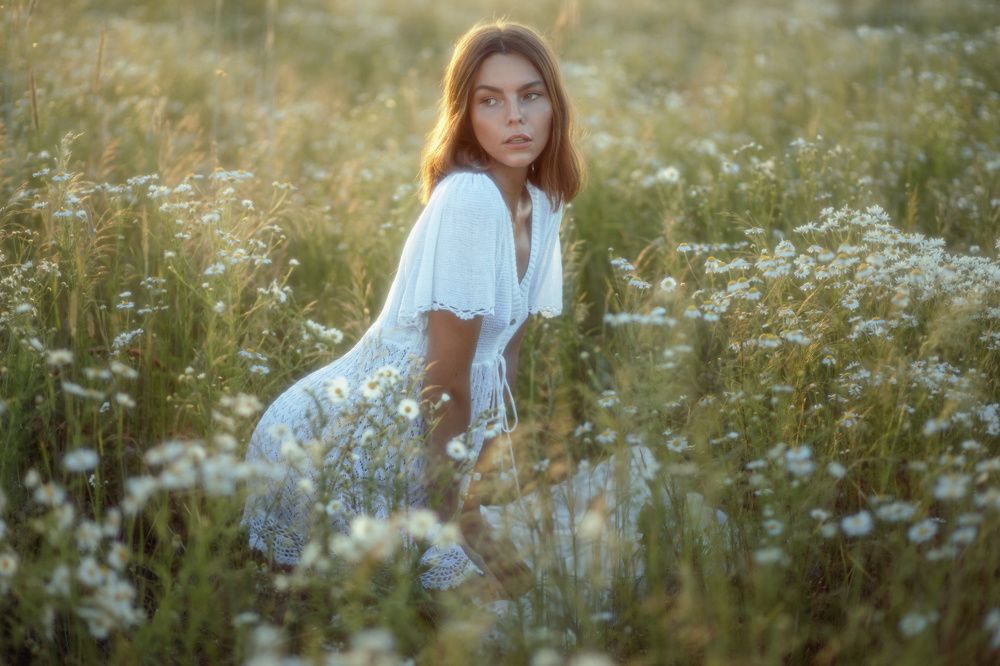 Girl and daisies