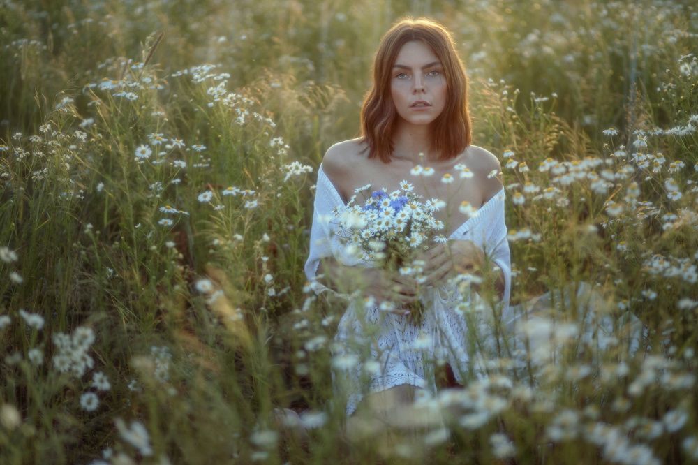 Girl and daisies