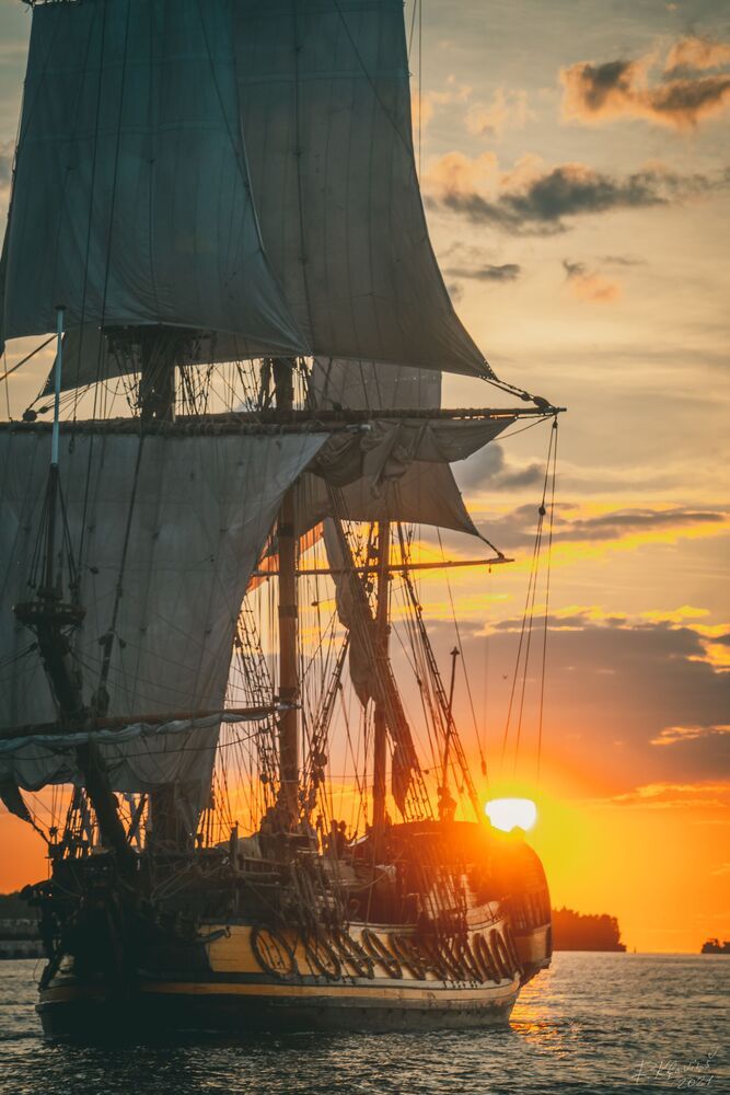 The Frigate Shtandar in calm weather sailing sunset time Riga Latvia