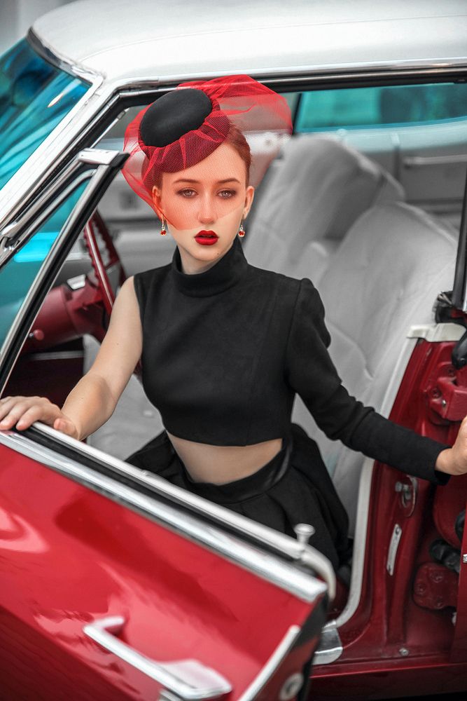 Lady and red Cadillac