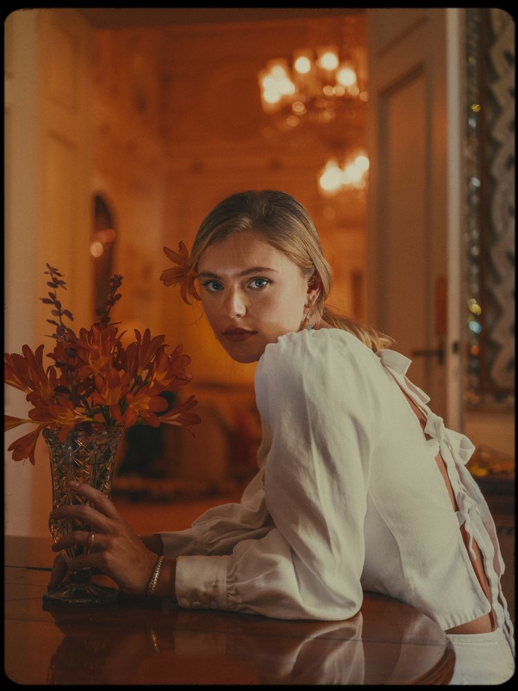 Molly with her beautiful orange flowers