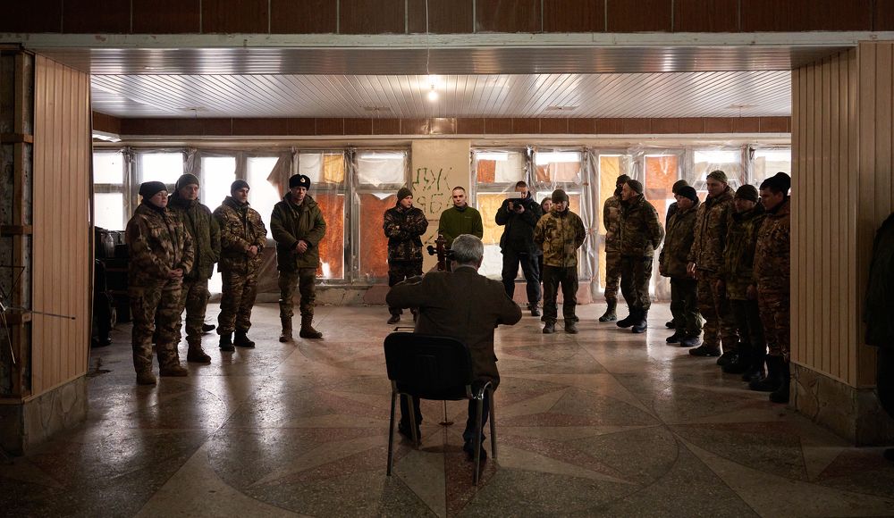 Не бывает атеистов в окопах под огнем
