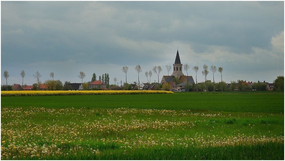 Fading dandelions and a Roman church.