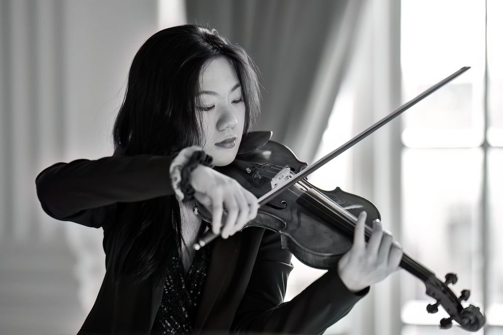 Closeup shot of a violinist during performance