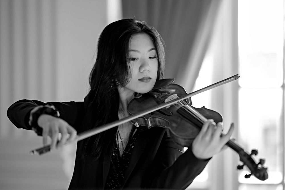 Closeup shot of a violinist during performance
