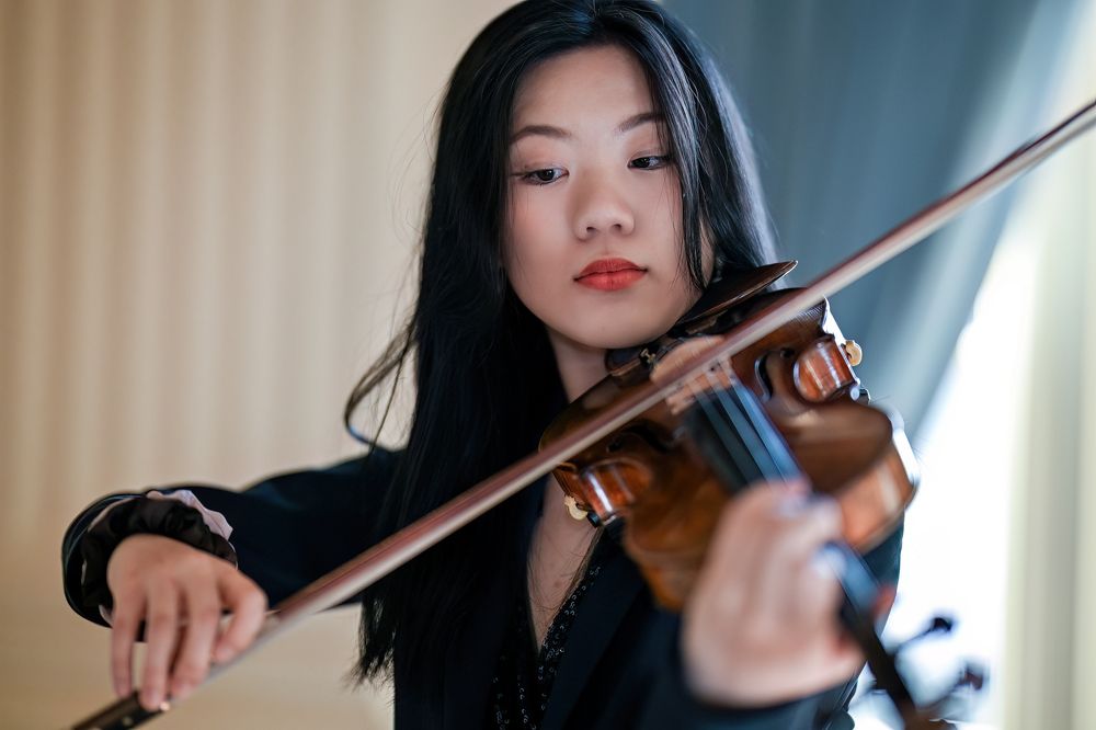 Closeup shot of a violinist during performance