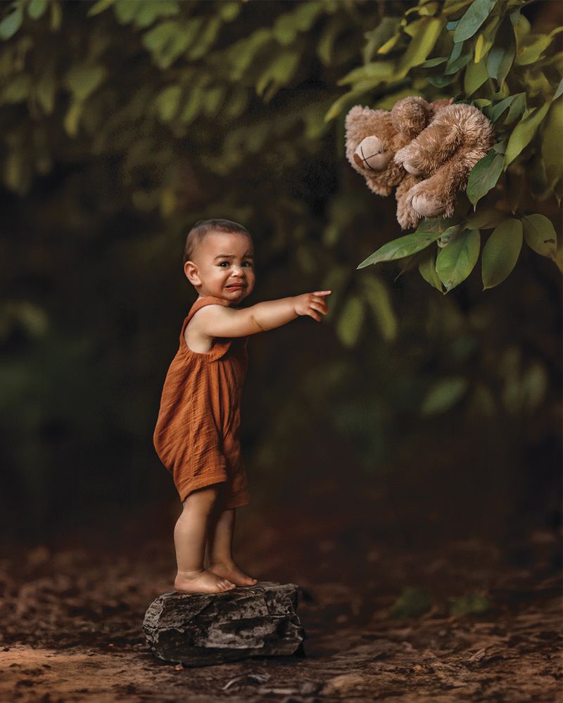 A baby and a bear