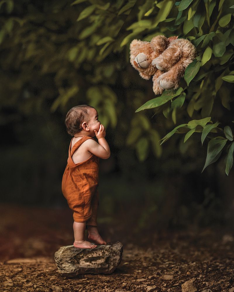 A baby and a bear