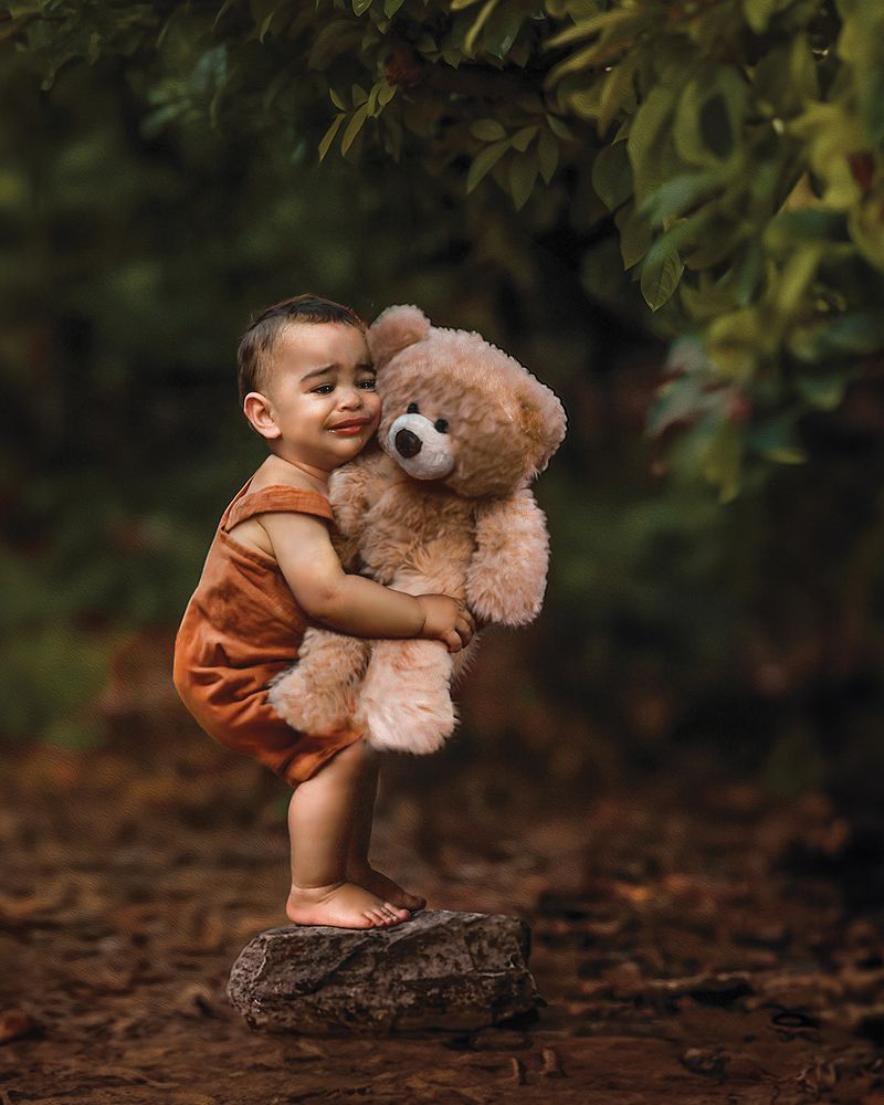 A baby and a bear