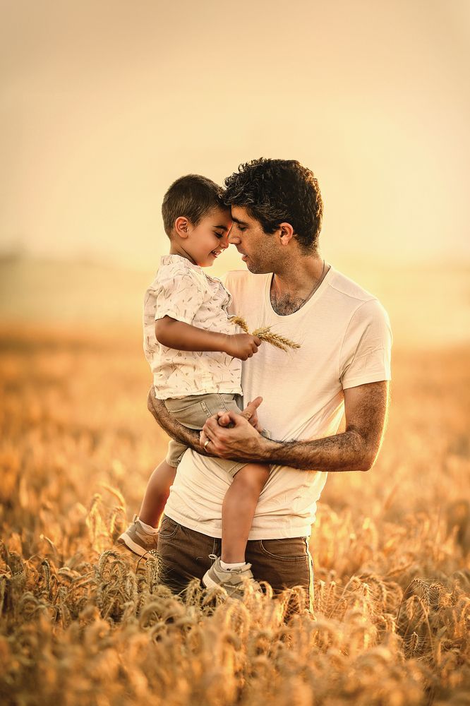 Father and son in a wheat field