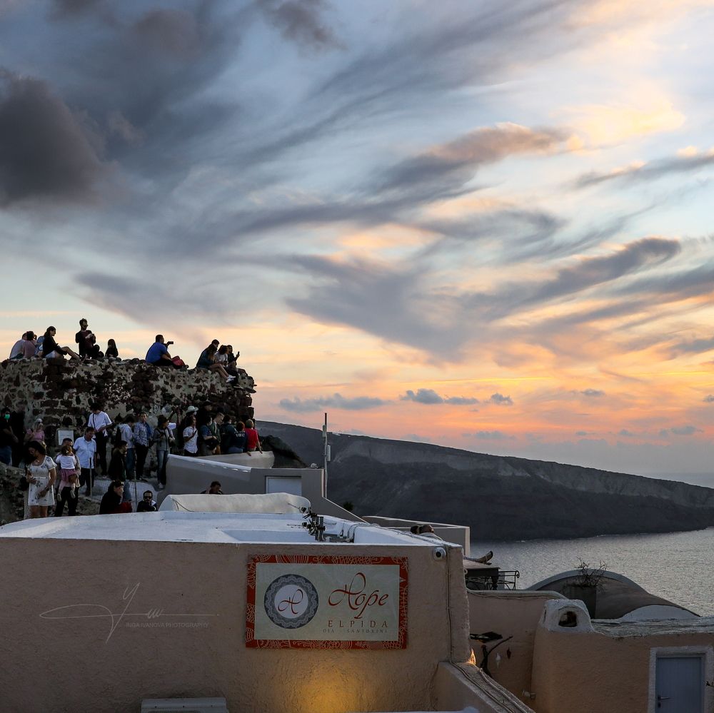 Magnificent sunset view from Oia, Santorini to the Caldera