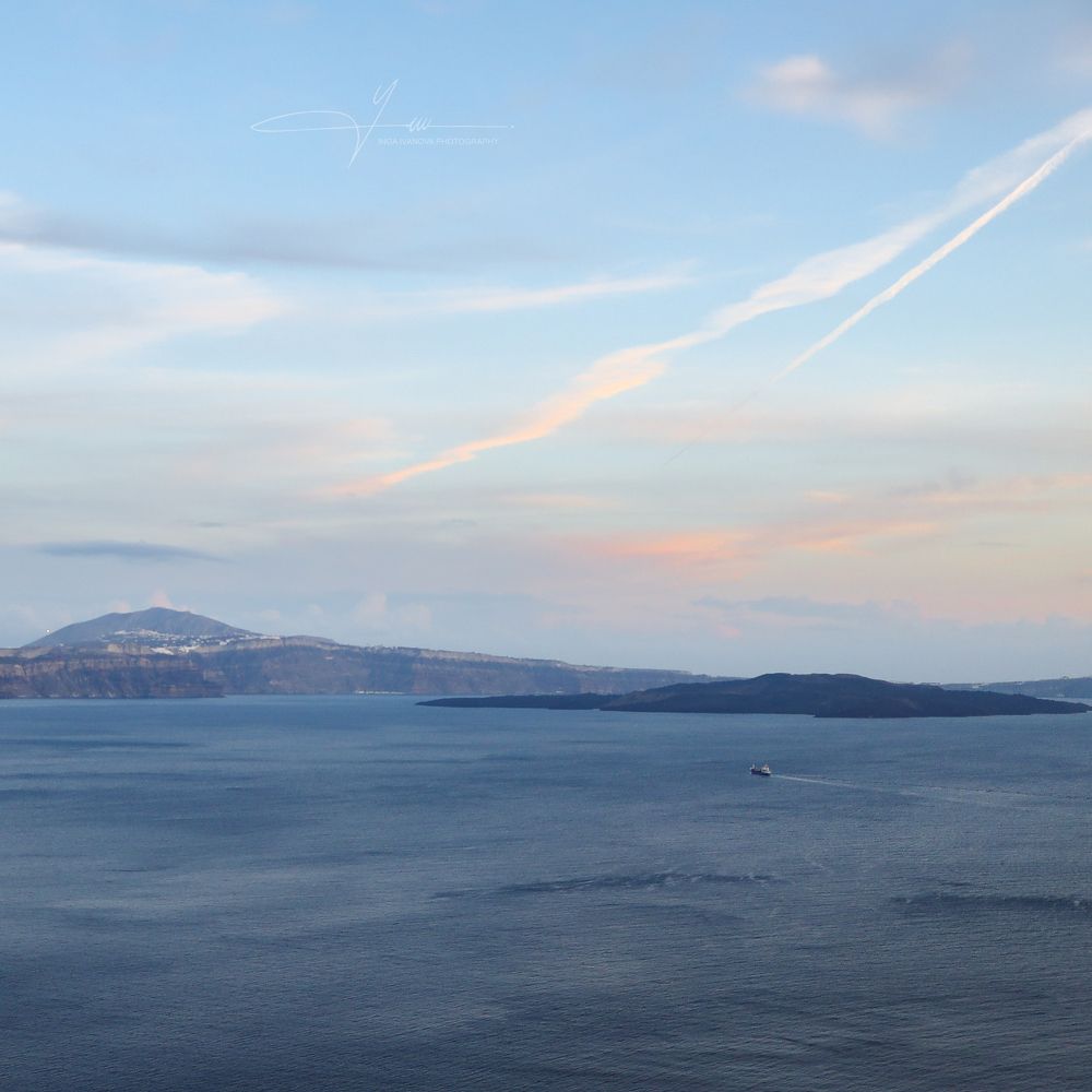 Magnificent sunset view from Oia, Santorini to the Caldera