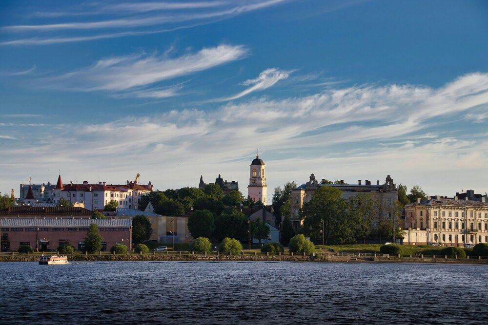 Города