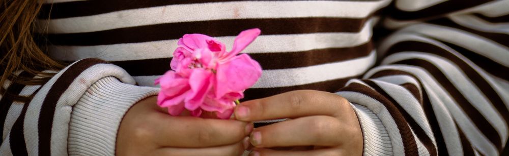 girl with flower ring