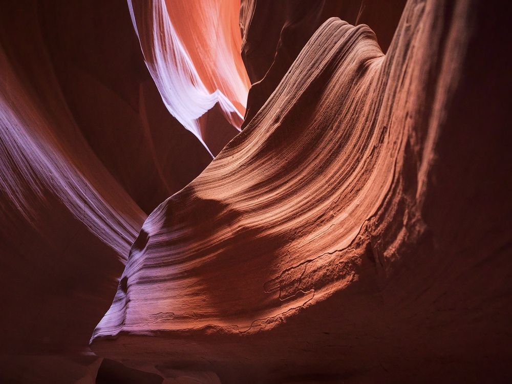 Where stone forgets it is stone and flows like silk.
