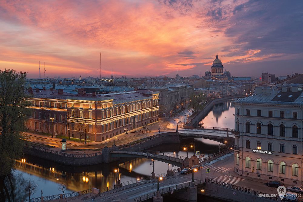 The Potseluev Bridge (literally Bridge of Kisses) is a bridge across the Moyka River in Saint Petersburg, Russia. The name of the bridge spurred numerous urban legends. The panoramic view of Saint Isaac's Cathedral that opens from the bridge makes it a popular subject of artists paintings.