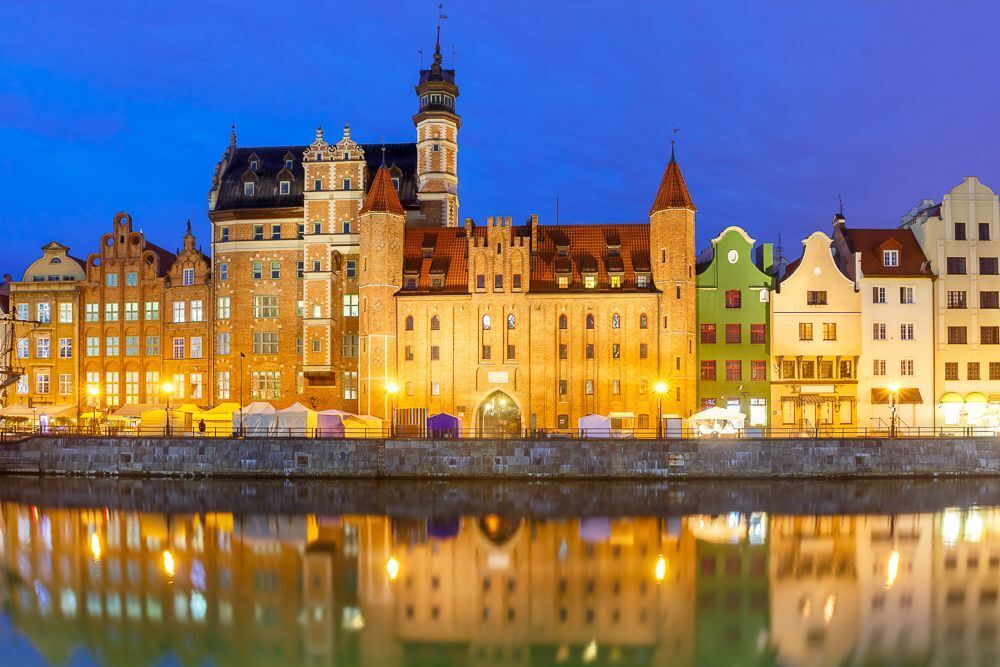 Old Town of Gdansk, Dlugie Pobrzeze and Motlawa River in night, Poland
