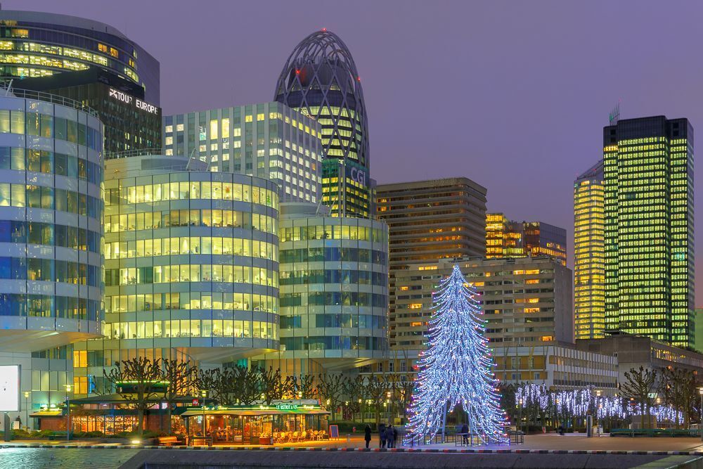 Christmas tree among the skyscrapers of La Defense, Paris, France.