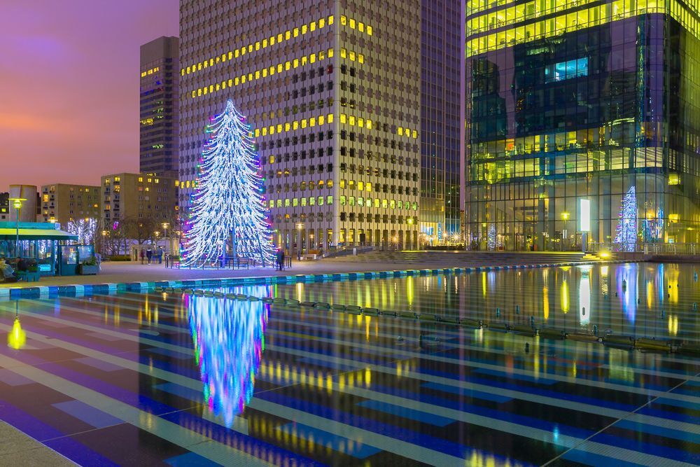Christmas tree among the skyscrapers in Paris, France