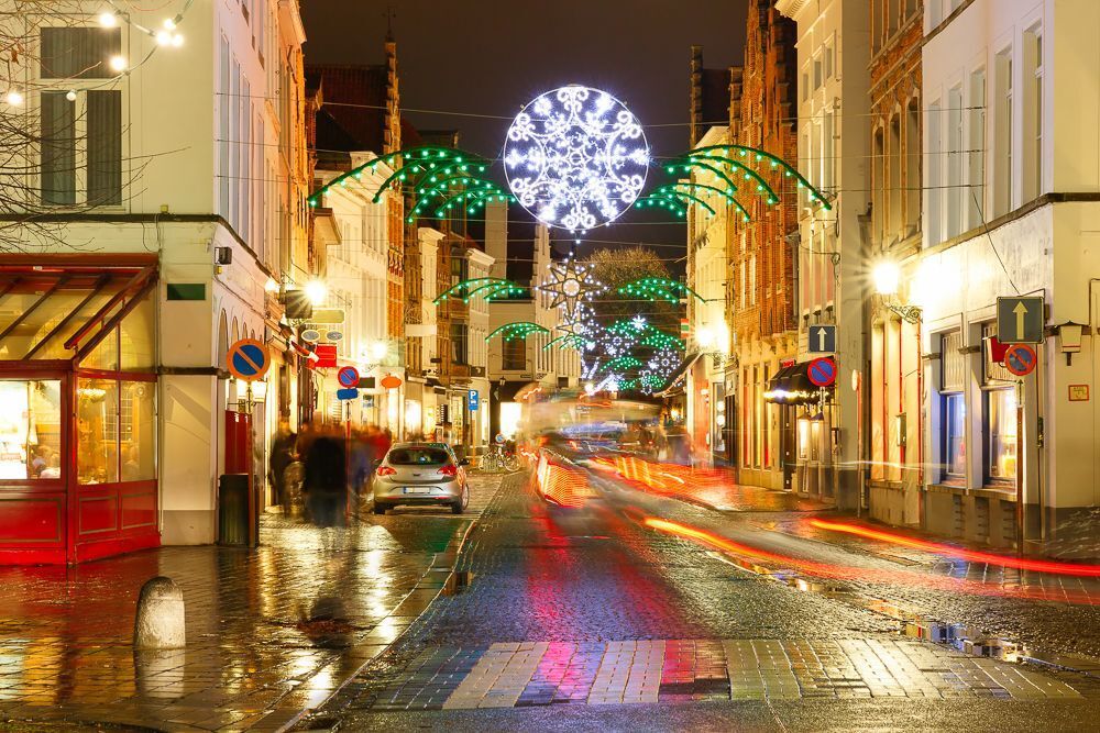 Decorated and illuminated Christmas street near Sint-Salvator Cathedral in Bruges, Flanders, Belgium