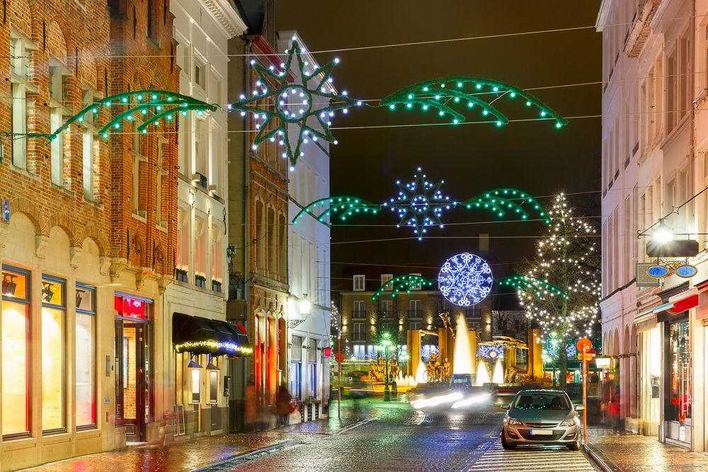 Decorated and illuminated Christmas street near Sint-Salvator Cathedral in Bruges, Flanders, Belgium
