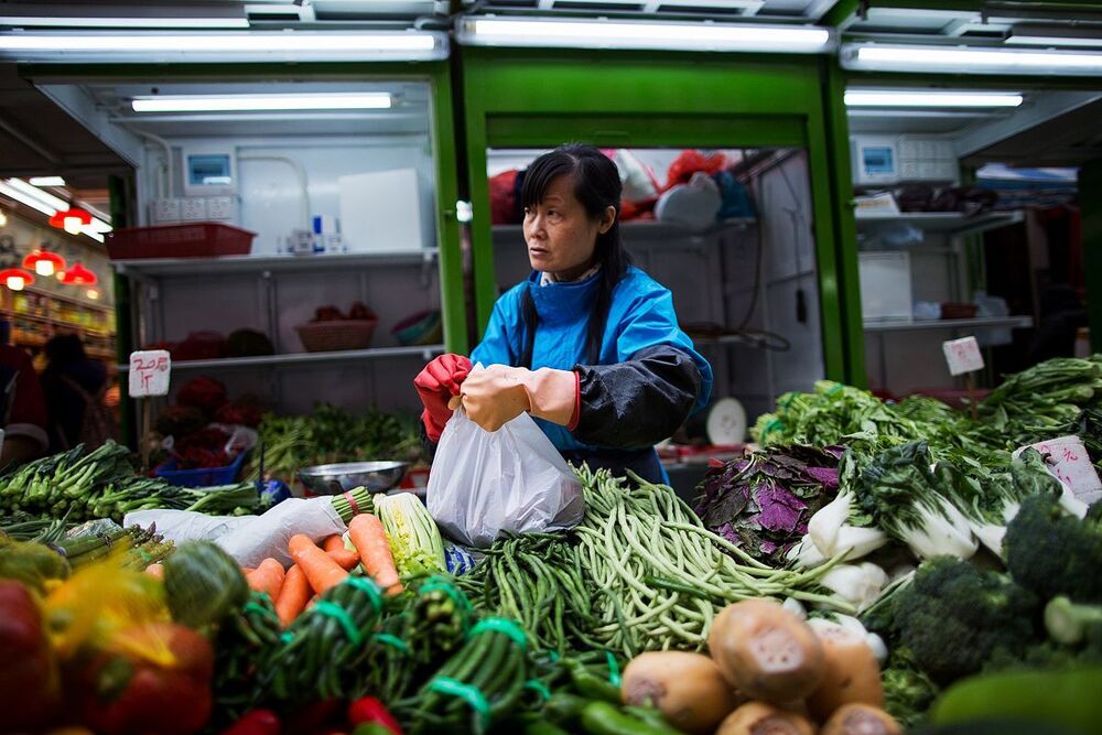 Продавцы с рынка в Гонконге