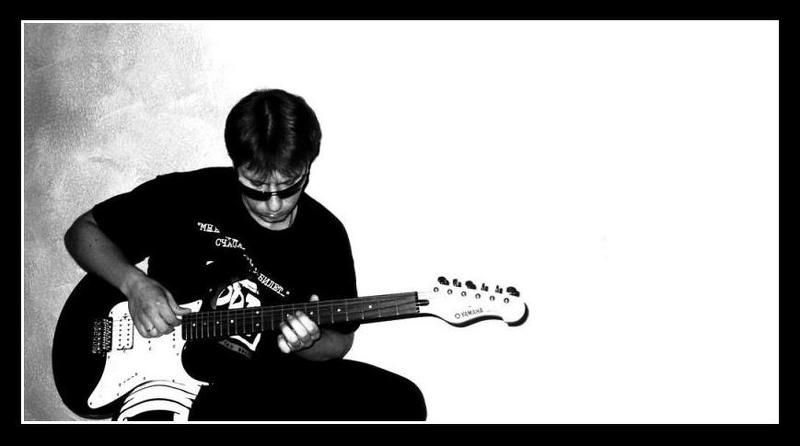 портрет гитарист фото превью